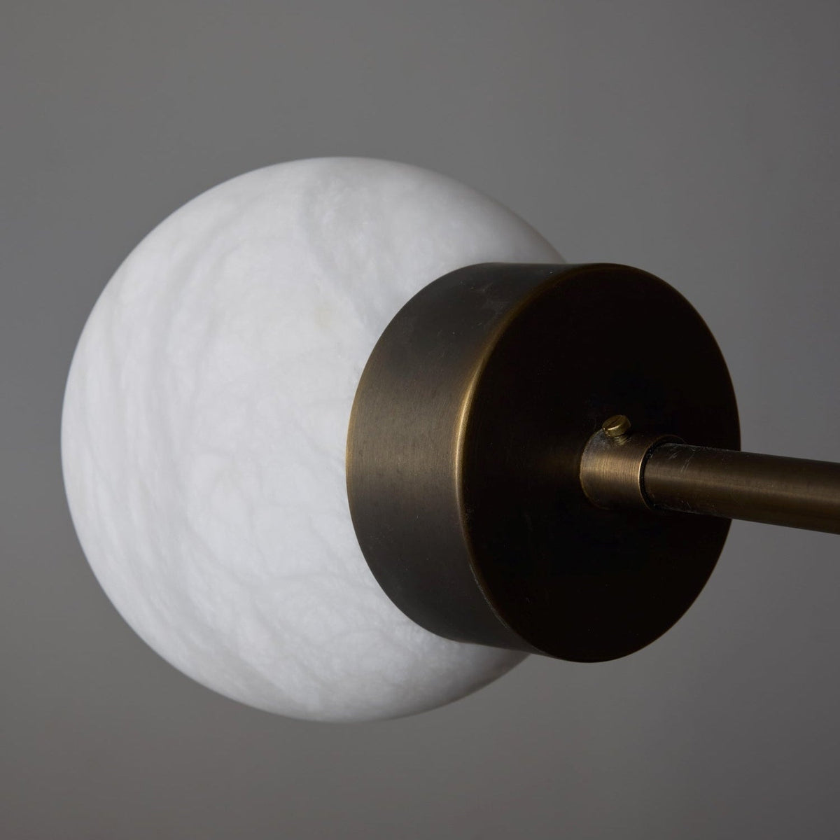 Brass and Alabaster Globes Asymmetrical Line Chandelier