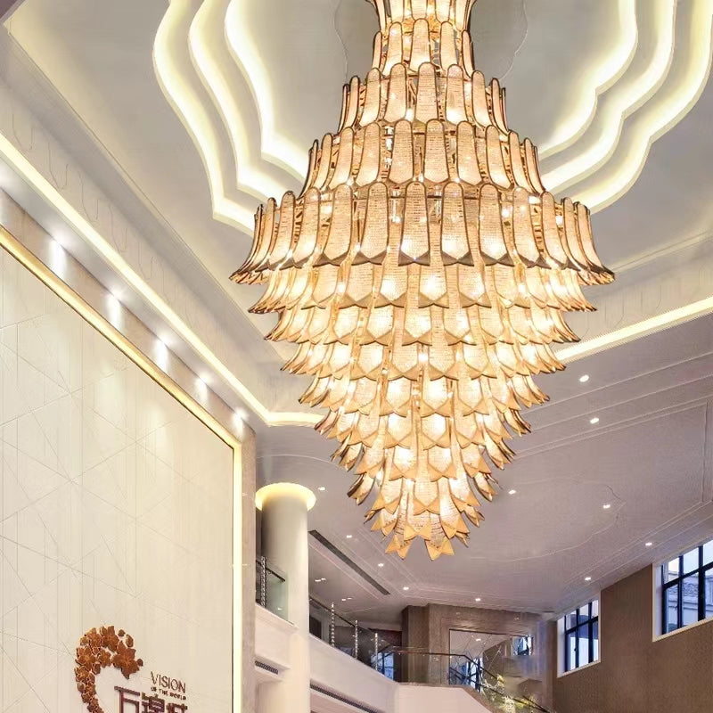https://cdn.shopify.com/s/files/1/0736/8795/7790/files/extra-large-luxury-multi-tier-gold-crystalchandelier-for-stairslarge-high-ceiling-room-merlin-lamps-7.jpg?v=1765406242