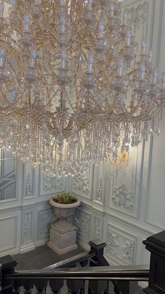 https://cdn.shopify.com/s/files/1/0778/2046/1351/files/extra-large-multi-tiered-candle-light-crystal-chandelier-for-hotelrestaurant-merlin-lamps-3.jpg?v=1765781477