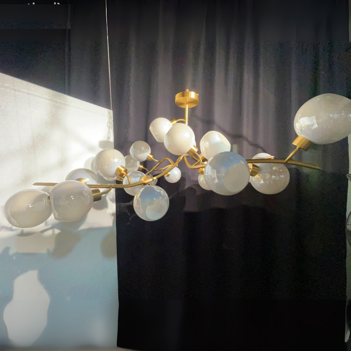 https://cdn.shopify.com/s/files/1/0554/8562/8591/files/lyfairsModernHand-blownGlassGlobesBranchChandelierforLivingDiningRoomKitchenIsland.png?v=1773475187